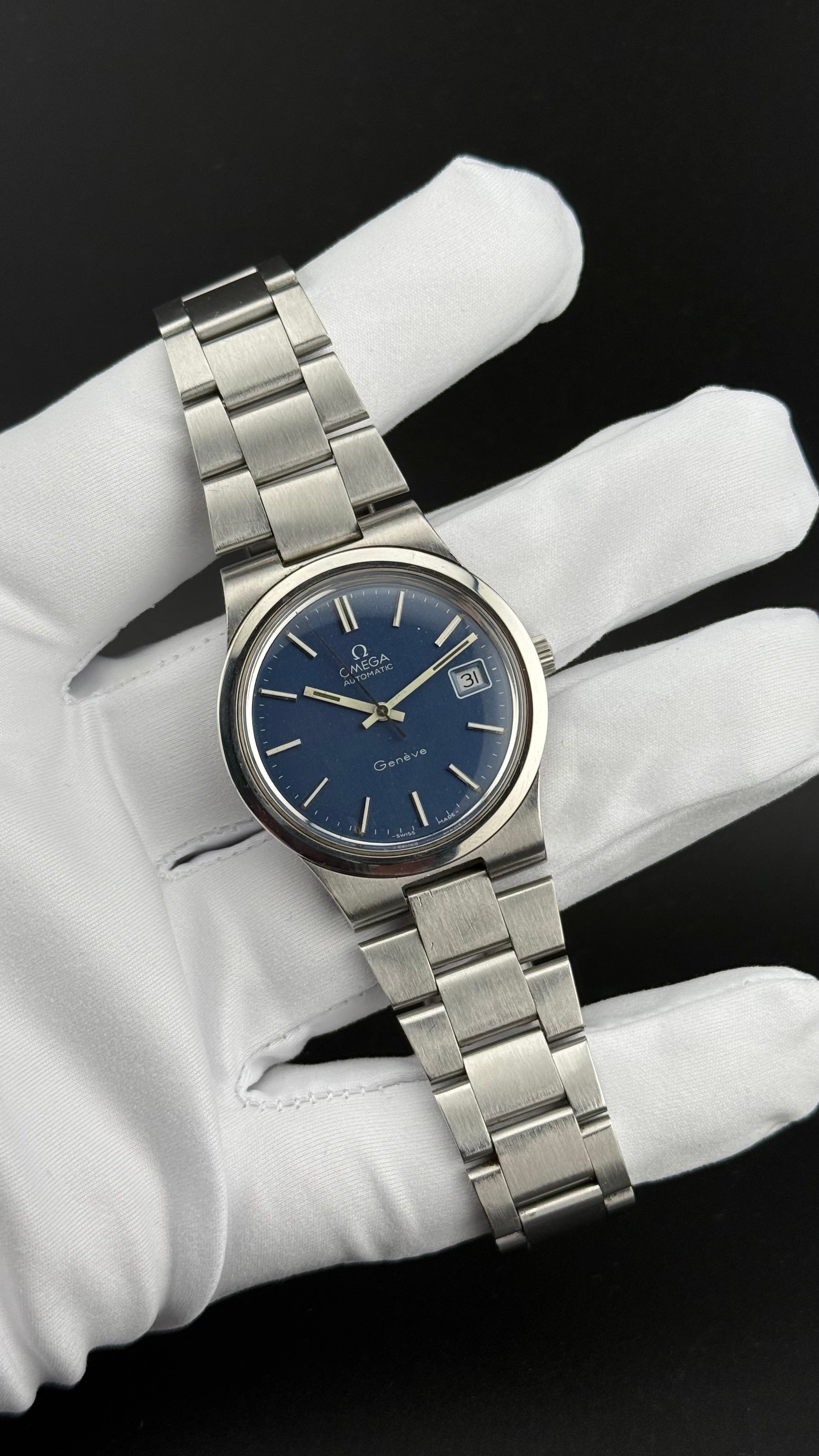 Omega Genève 166.0173 cadran bleu bracelet intégré