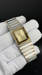 Omega Constellation Tank 197.0001 cadran champagne lunette or 18K