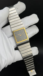 Concord Mariner SG Square cadran noir gaufré lunette or 18K